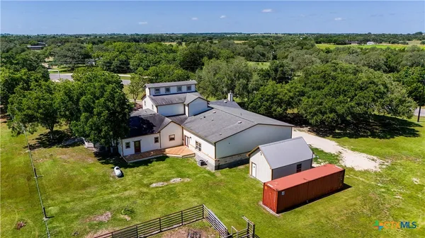 a view of a room with a big yard