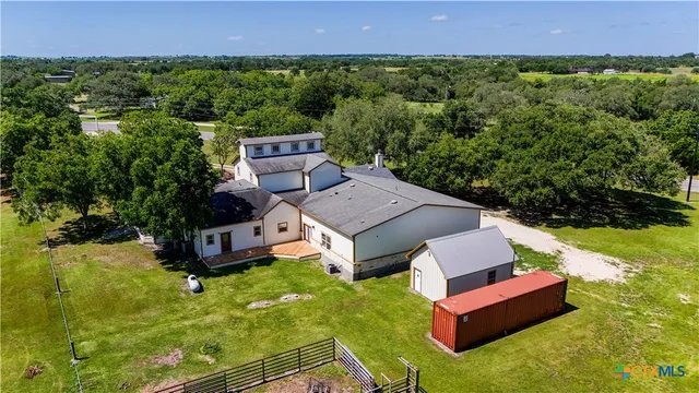 a view of a room with a big yard
