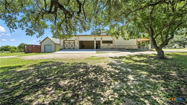 a view of a golf course with a lake