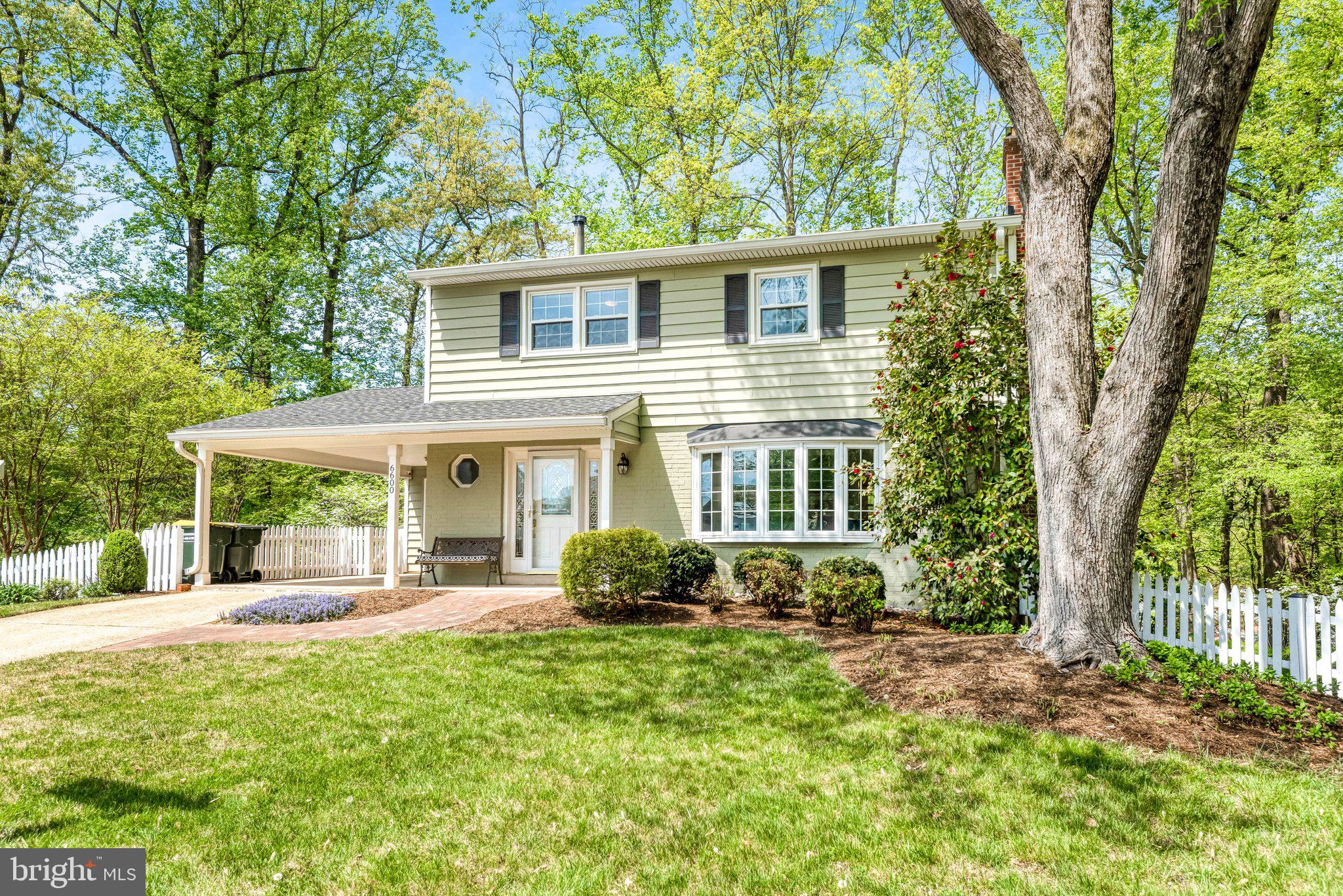 6600 Kensal Court Springfield, VA 22152 - Photo 2 of 43 a front view of a house with garden