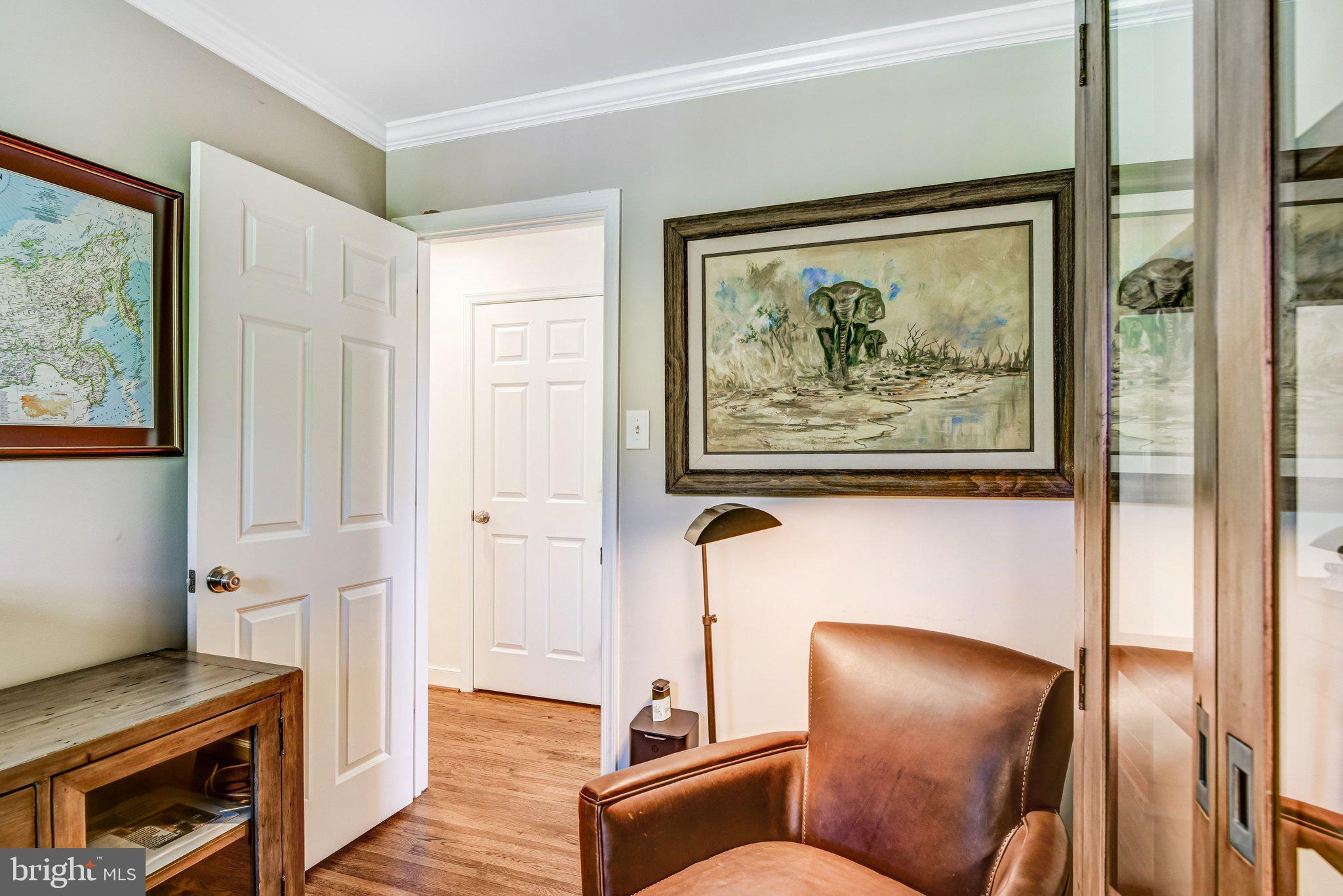 6600 Kensal Court Springfield, VA 22152 - Photo 31 of 43 a living room with furniture and a painting on the wall