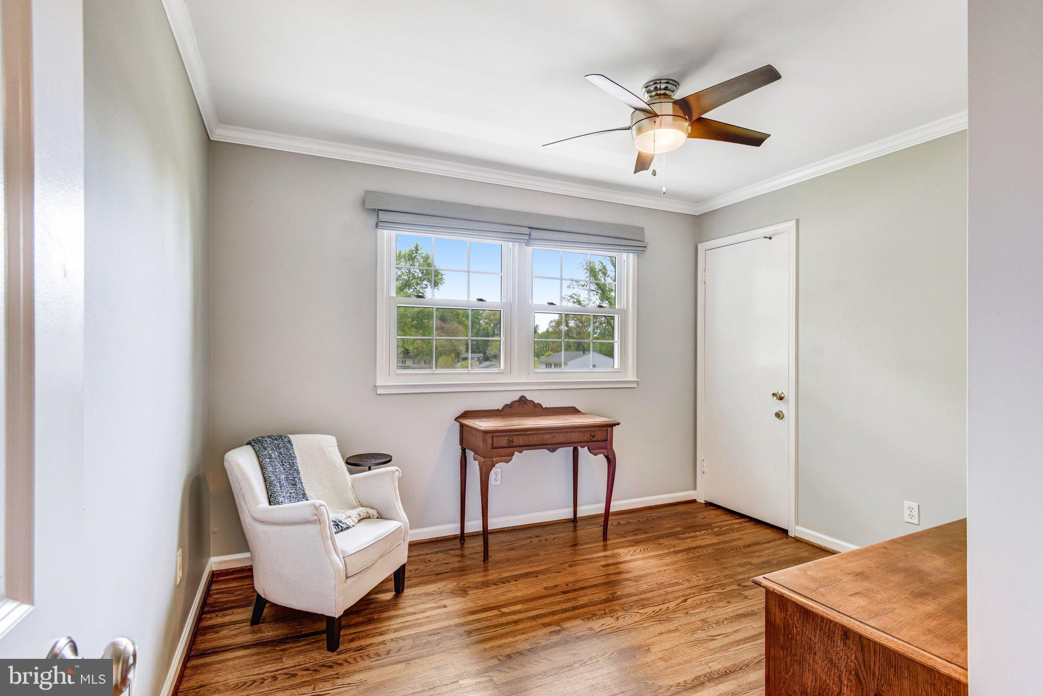 6600 Kensal Court Springfield, VA 22152 - Photo 32 of 43 a work room with wooden floor and white walls