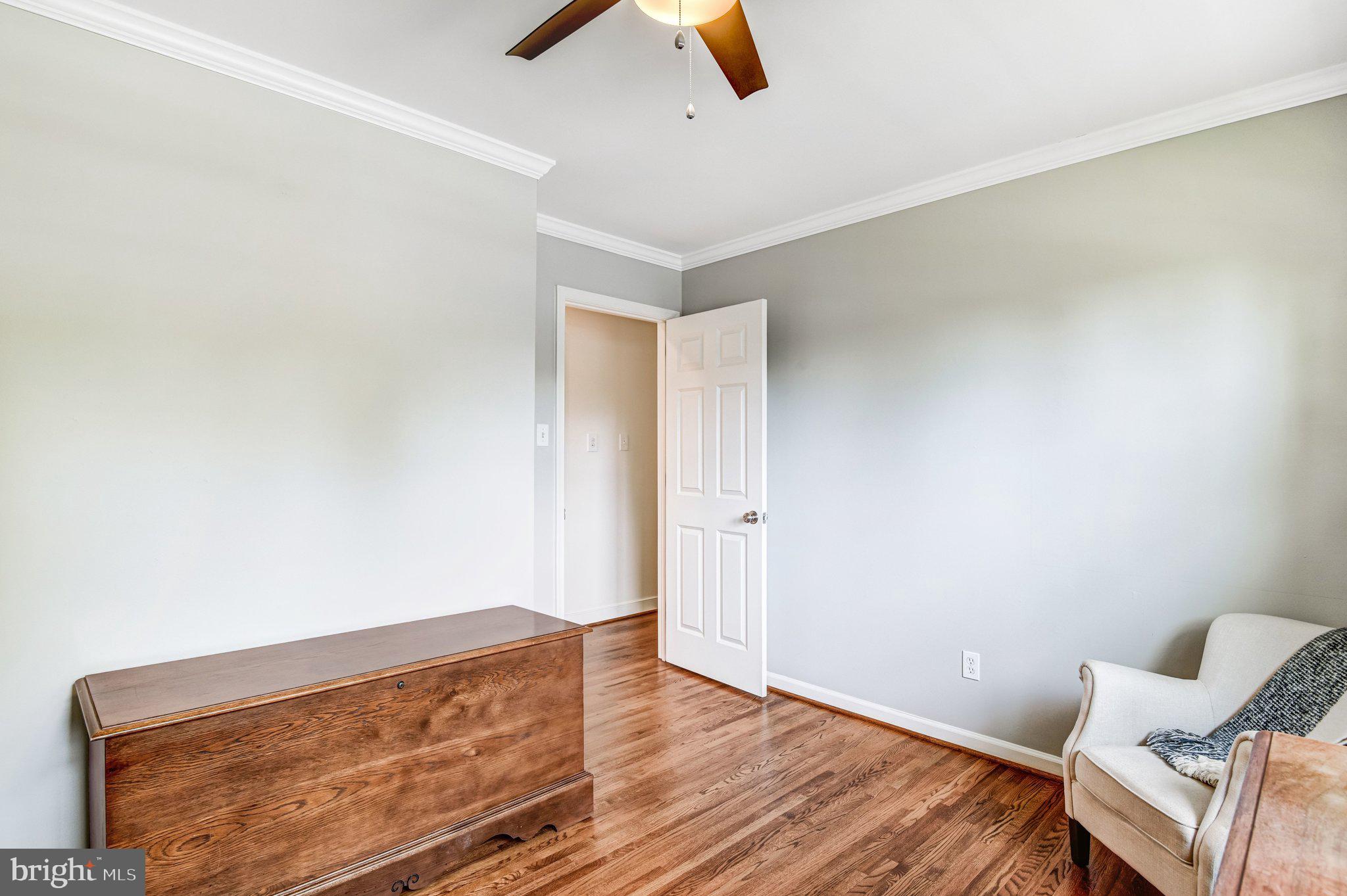 6600 Kensal Court Springfield, VA 22152 - Photo 33 of 43 a view of room with hardwood floor and ceiling fan