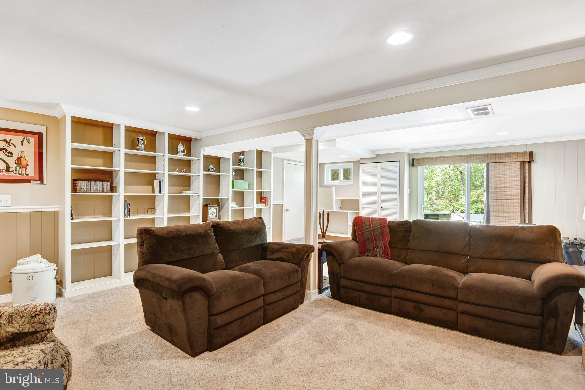 6600 Kensal Court Springfield, VA 22152 - Photo 37 of 43 a living room with furniture and a large window