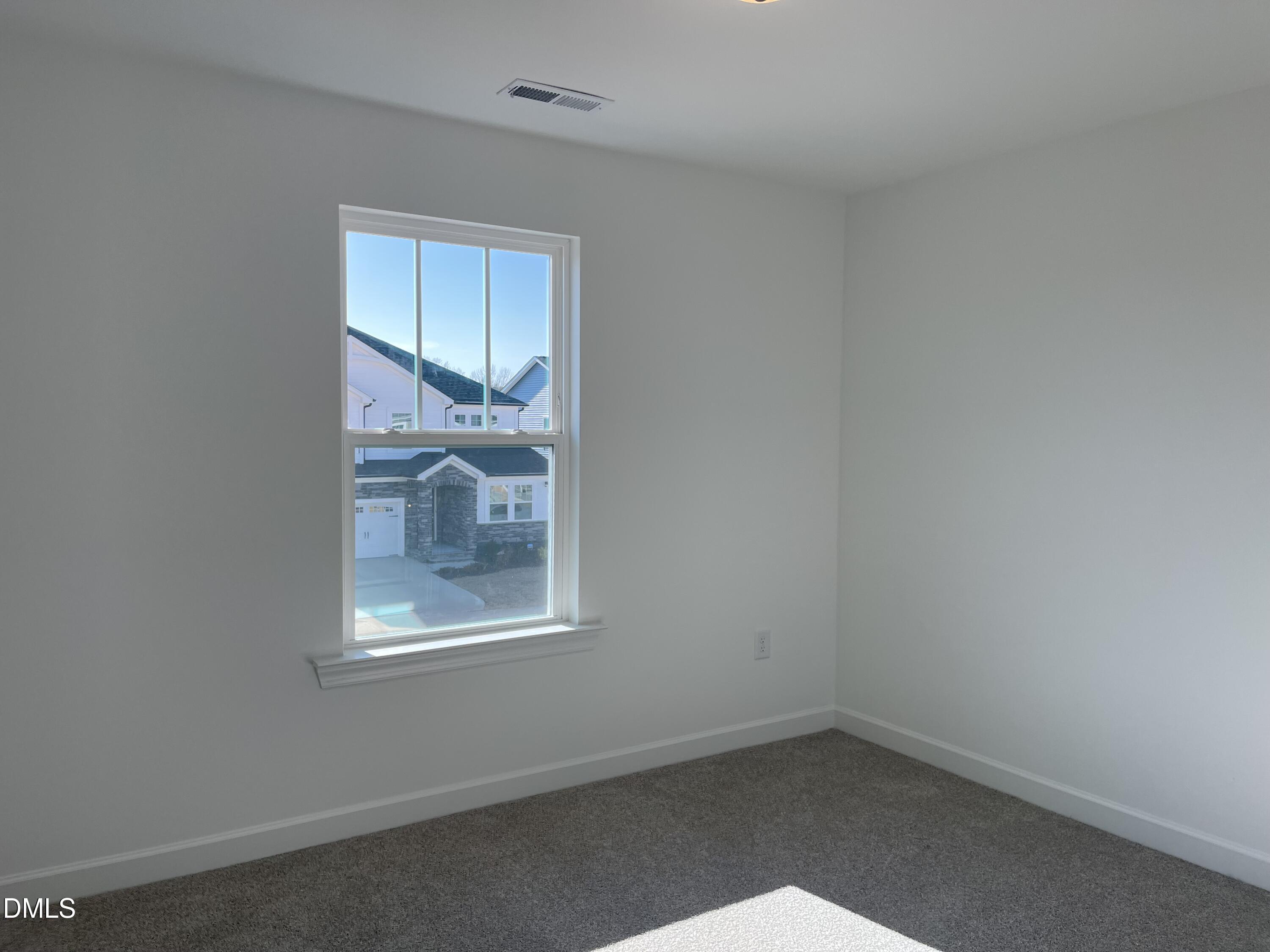 229 Sprenger Street Garner, NC 27529 - Photo 19 of 37 an empty room with a window