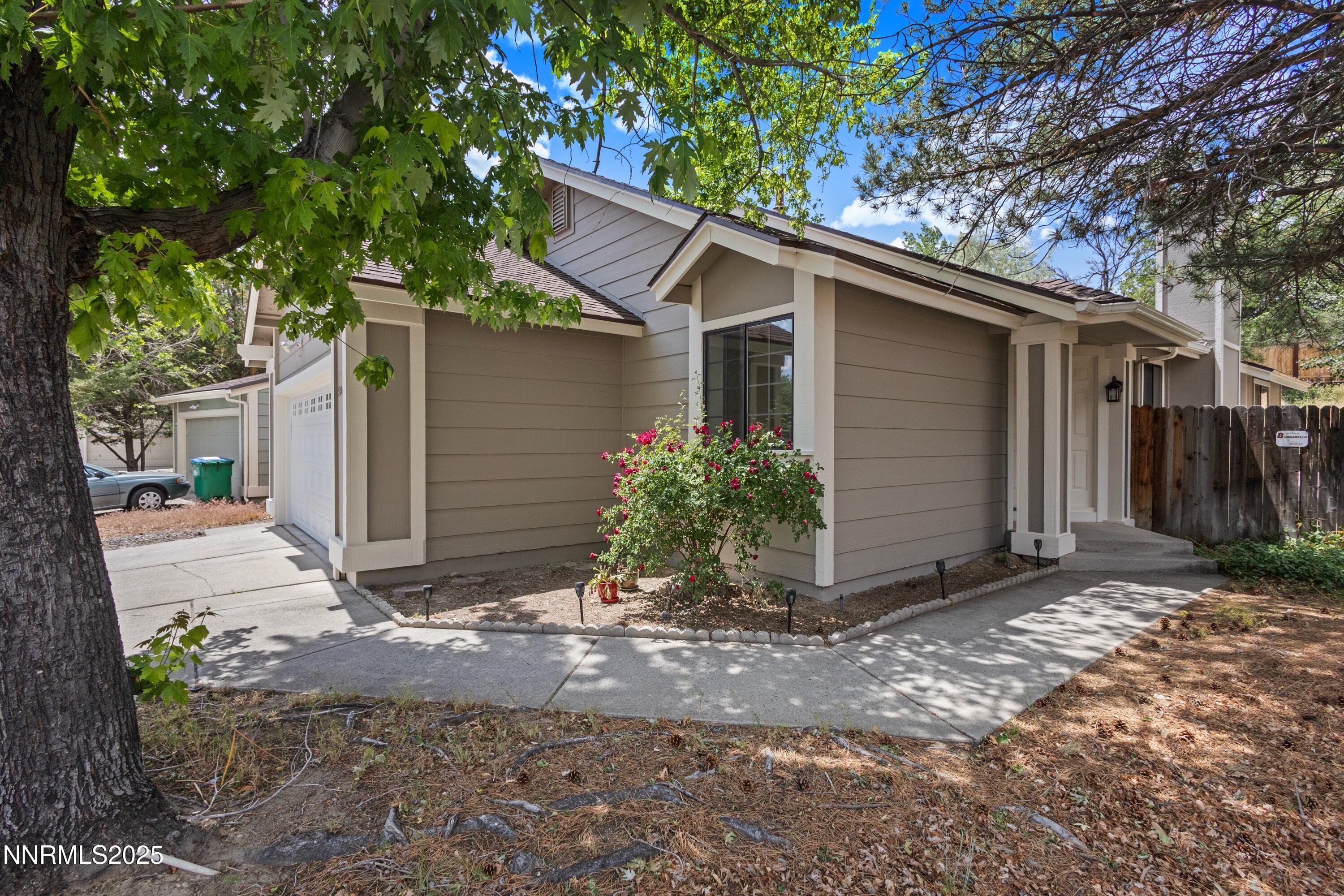 5809 Sydney Court Reno, NV 89523 - Photo 1 of 28 a view of a house with a yard