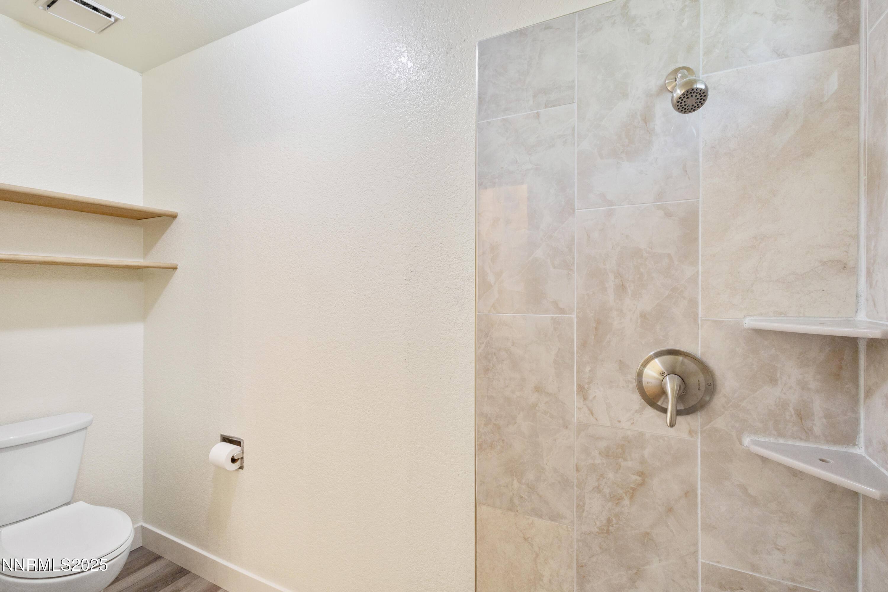 5809 Sydney Court Reno, NV 89523 - Photo 15 of 28 a bathroom with a shower