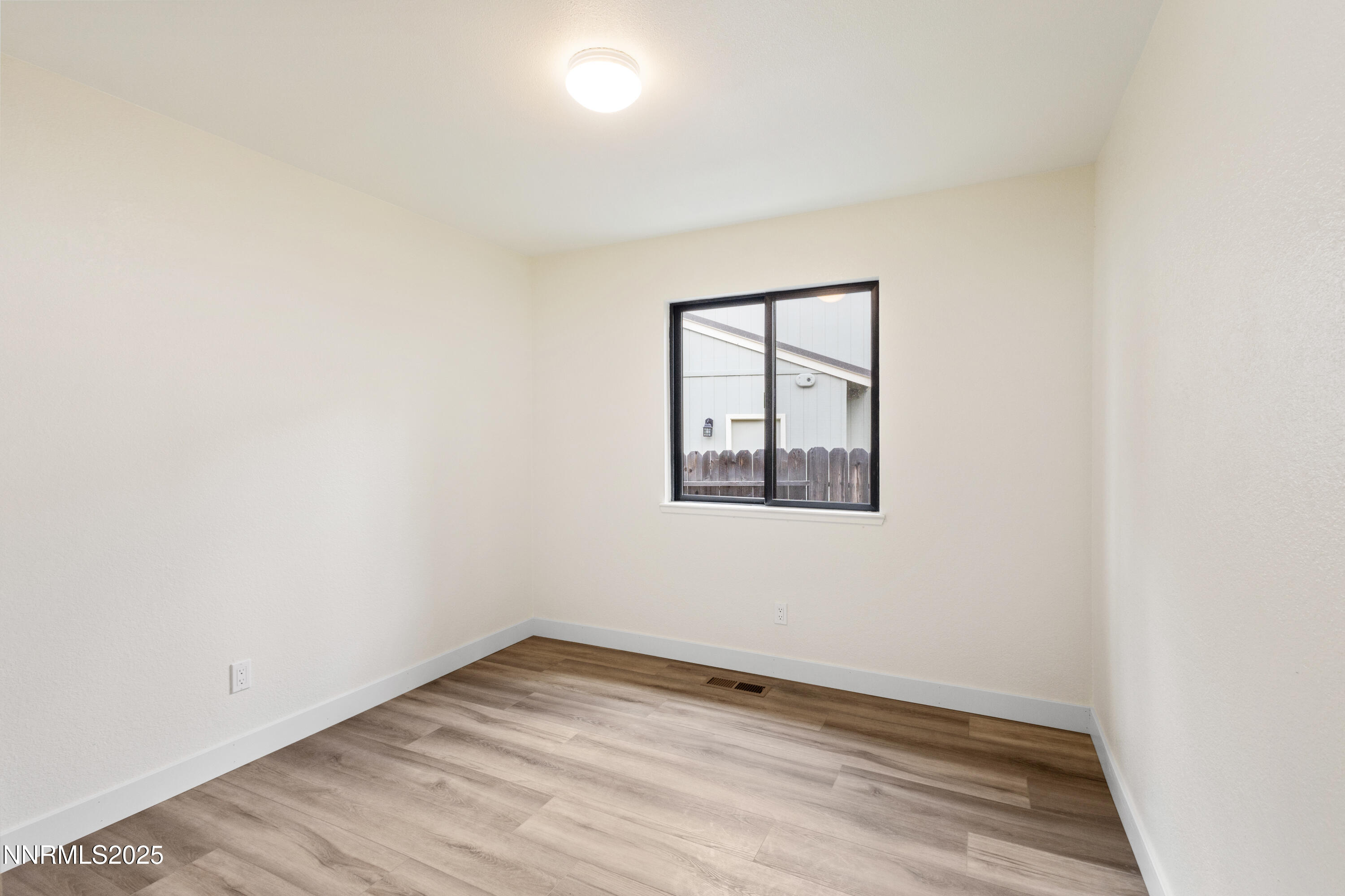 5809 Sydney Court Reno, NV 89523 - Photo 19 of 28 an empty room with a window