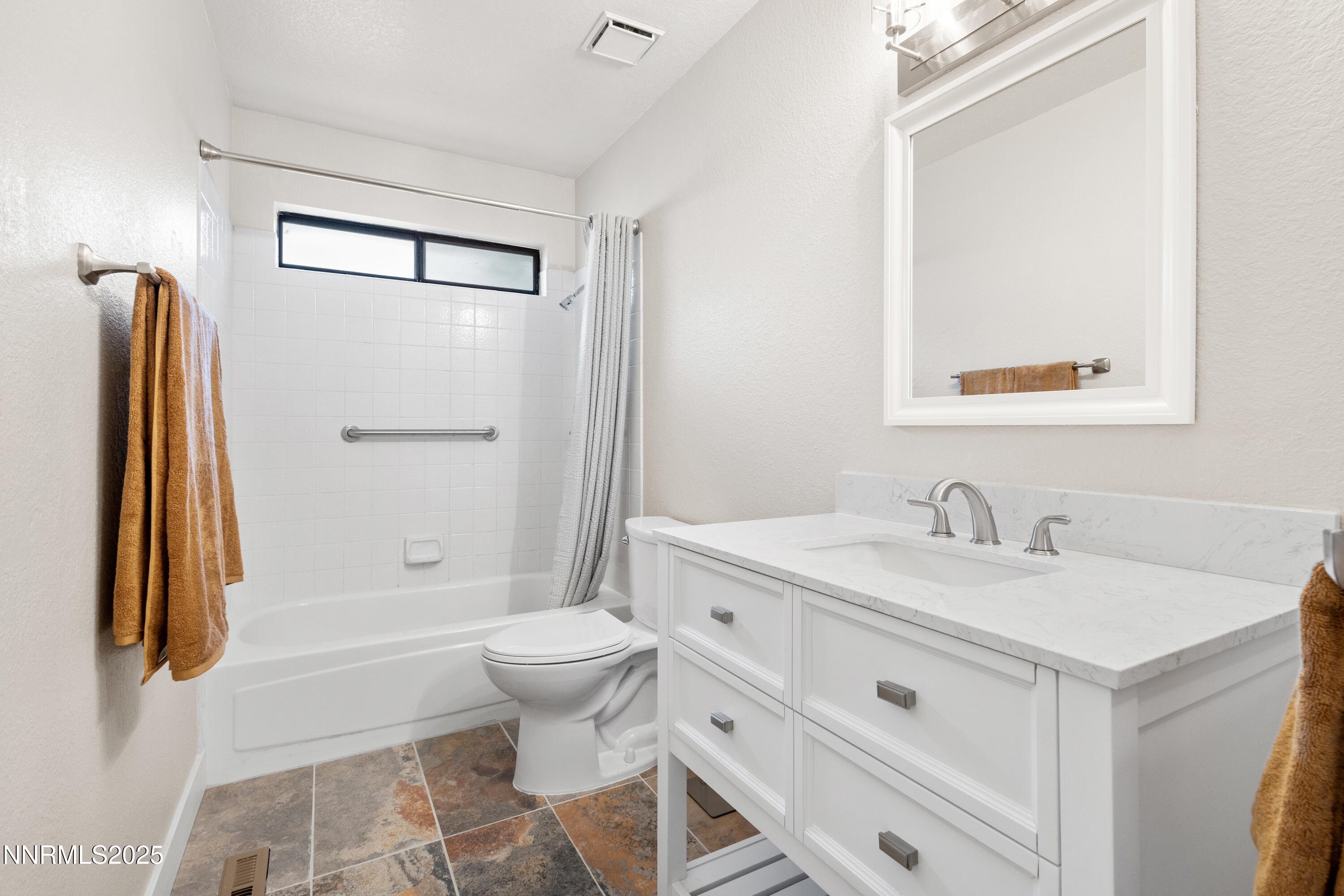 5809 Sydney Court Reno, NV 89523 - Photo 20 of 28 a bathroom with a sink toilet and shower