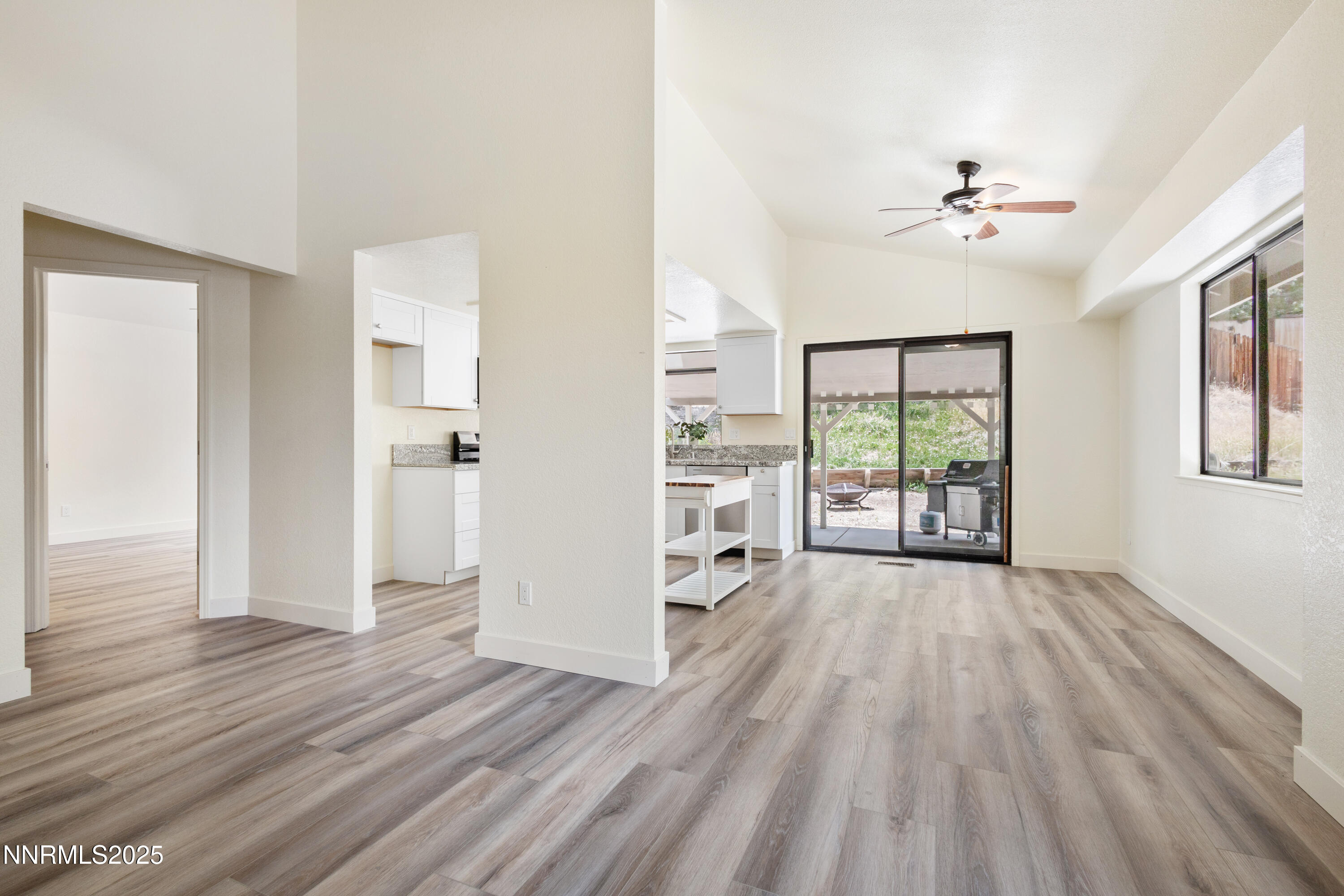 5809 Sydney Court Reno, NV 89523 - Photo 5 of 28 wooden floor in an empty room with a window
