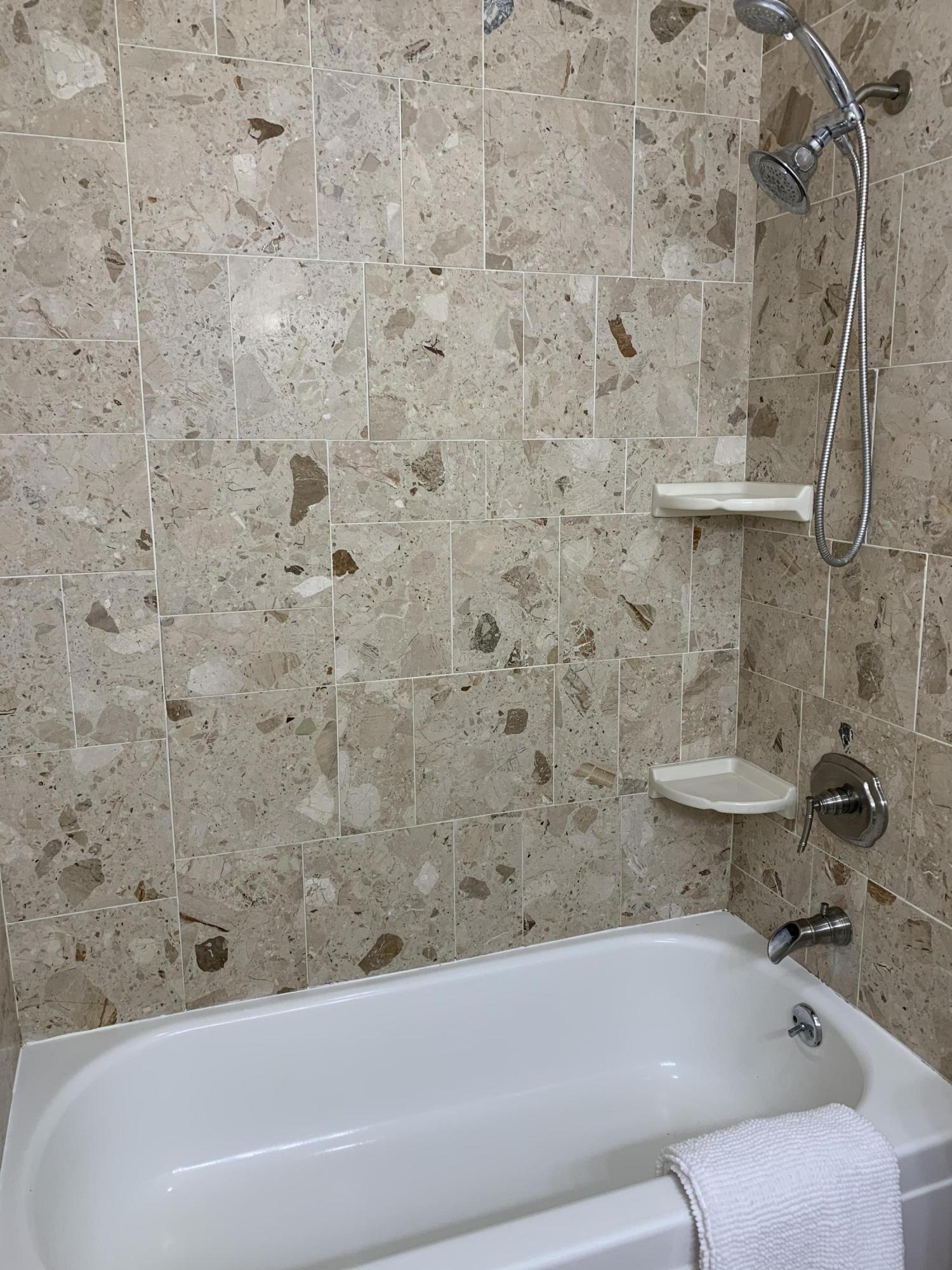 5785 Firebird Court Camarillo, CA 93012 - Photo 13 of 23 a bathroom with a bathtub and a toilet