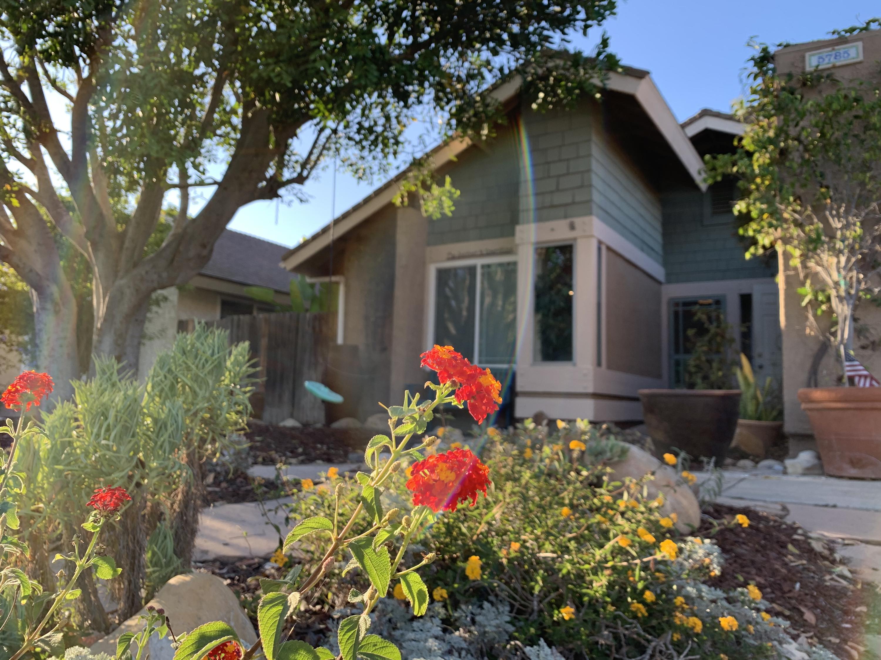 5785 Firebird Court Camarillo, CA 93012 - Photo 3 of 23 a front view of a house with a yard and fountain
