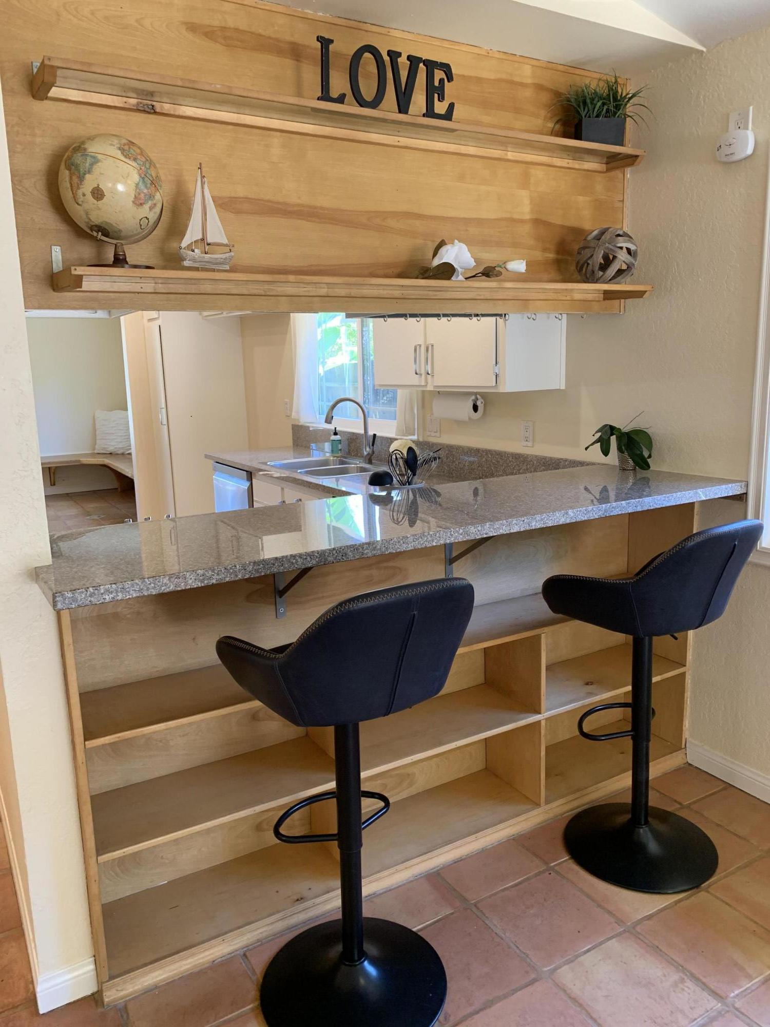 5785 Firebird Court Camarillo, CA 93012 - Photo 6 of 23 a kitchen with a table and chairs
