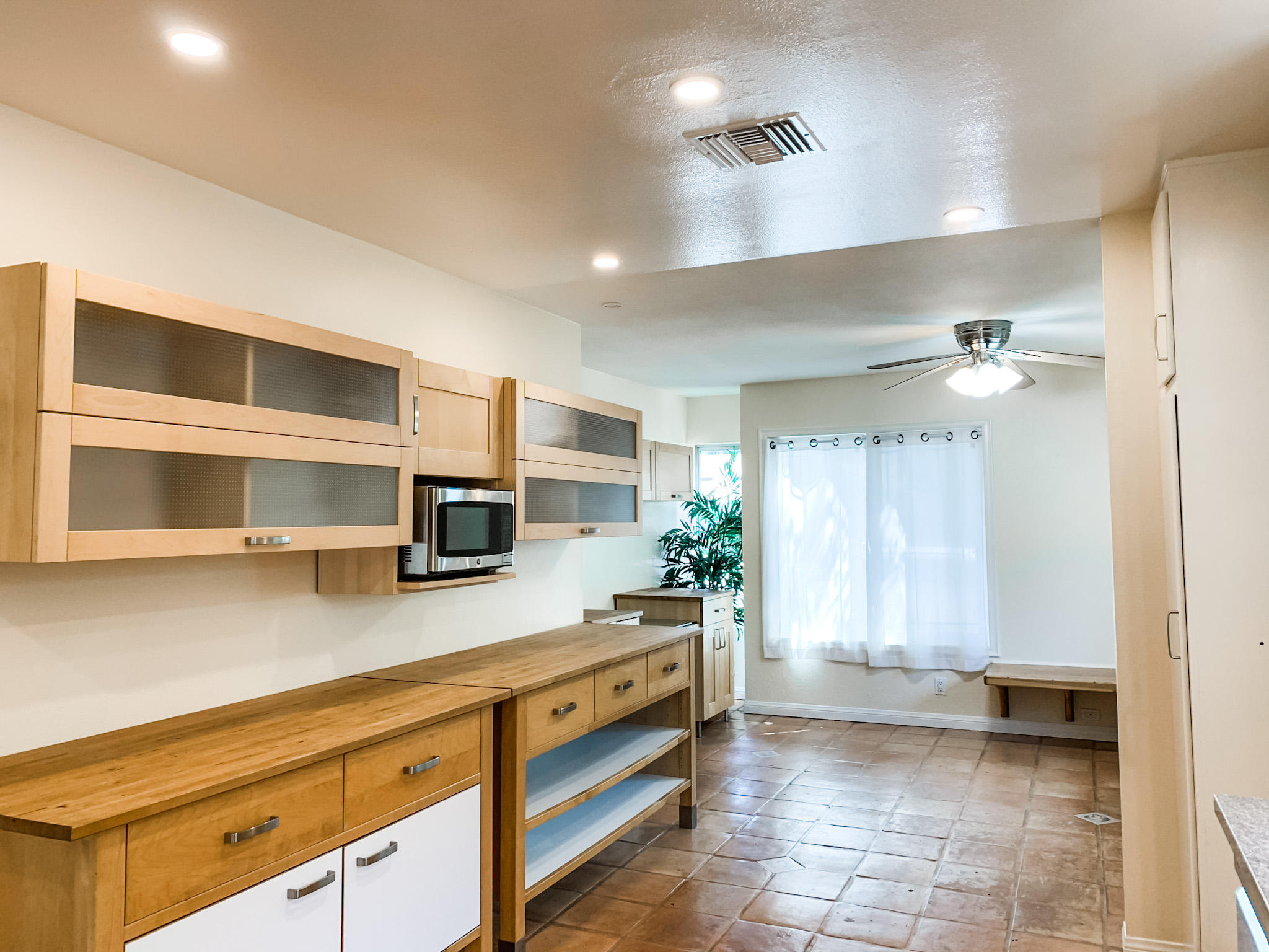 5785 Firebird Court Camarillo, CA 93012 - Photo 8 of 23 a kitchen with stainless steel appliances a stove and cabinets