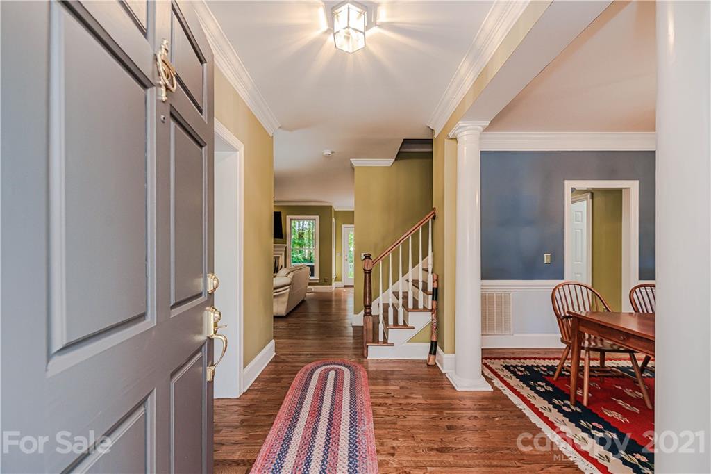 154 Morrison Hill Road Davidson, NC 28036 - Photo 2 of 23 a very nice looking room with wooden floor and furniture