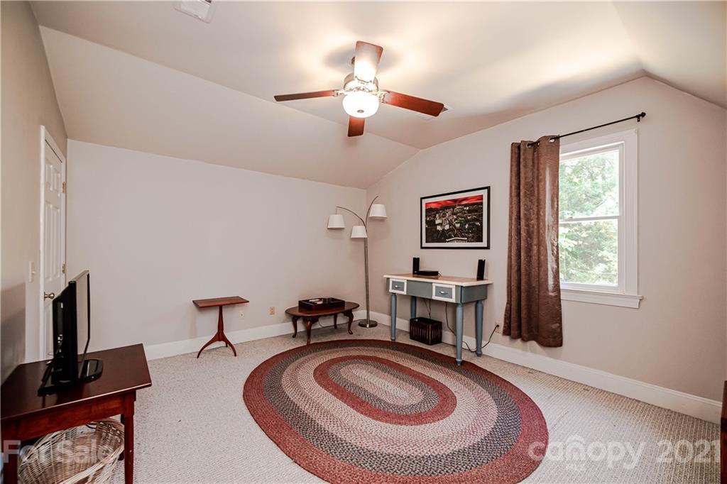 154 Morrison Hill Road Davidson, NC 28036 - Photo 18 of 23 a view of a livingroom with workspace and a window
