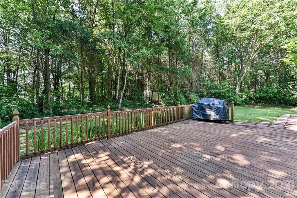 154 Morrison Hill Road Davidson, NC 28036 - Photo 19 of 23 a view of backyard with a small cabin