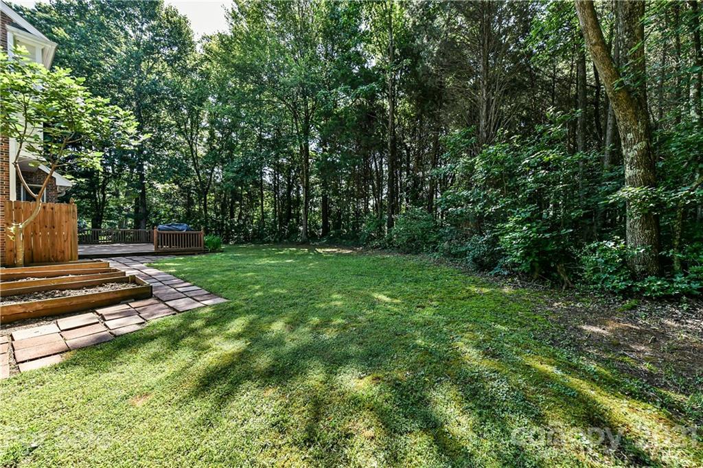 154 Morrison Hill Road Davidson, NC 28036 - Photo 20 of 23 a view of a garden with trees