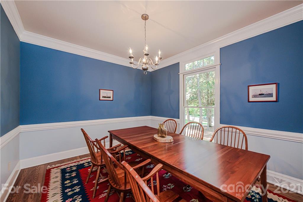 154 Morrison Hill Road Davidson, NC 28036 - Photo 3 of 23 a view of a dining room with furniture window and outside view
