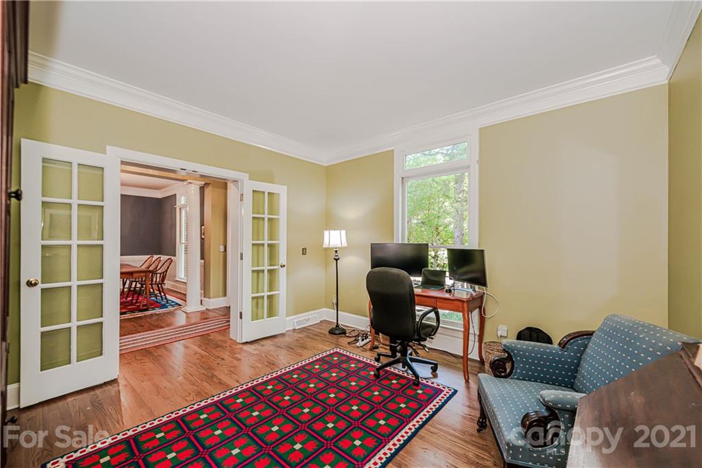 154 Morrison Hill Road Davidson, NC 28036 - Photo 5 of 23 a living room with furniture or couch and a window