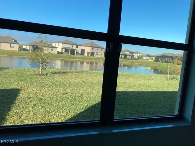 a house view with a backyard space