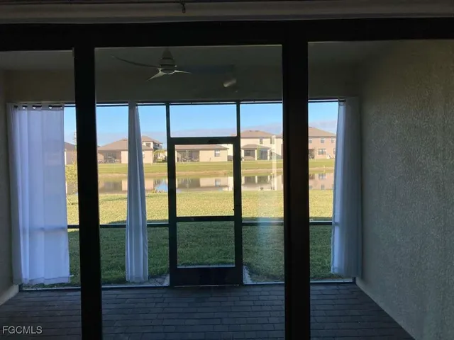 a view of a swimming pool with chairs