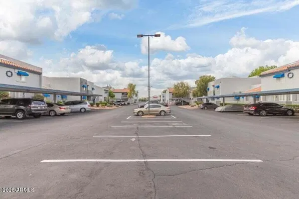 a view of a street with cars
