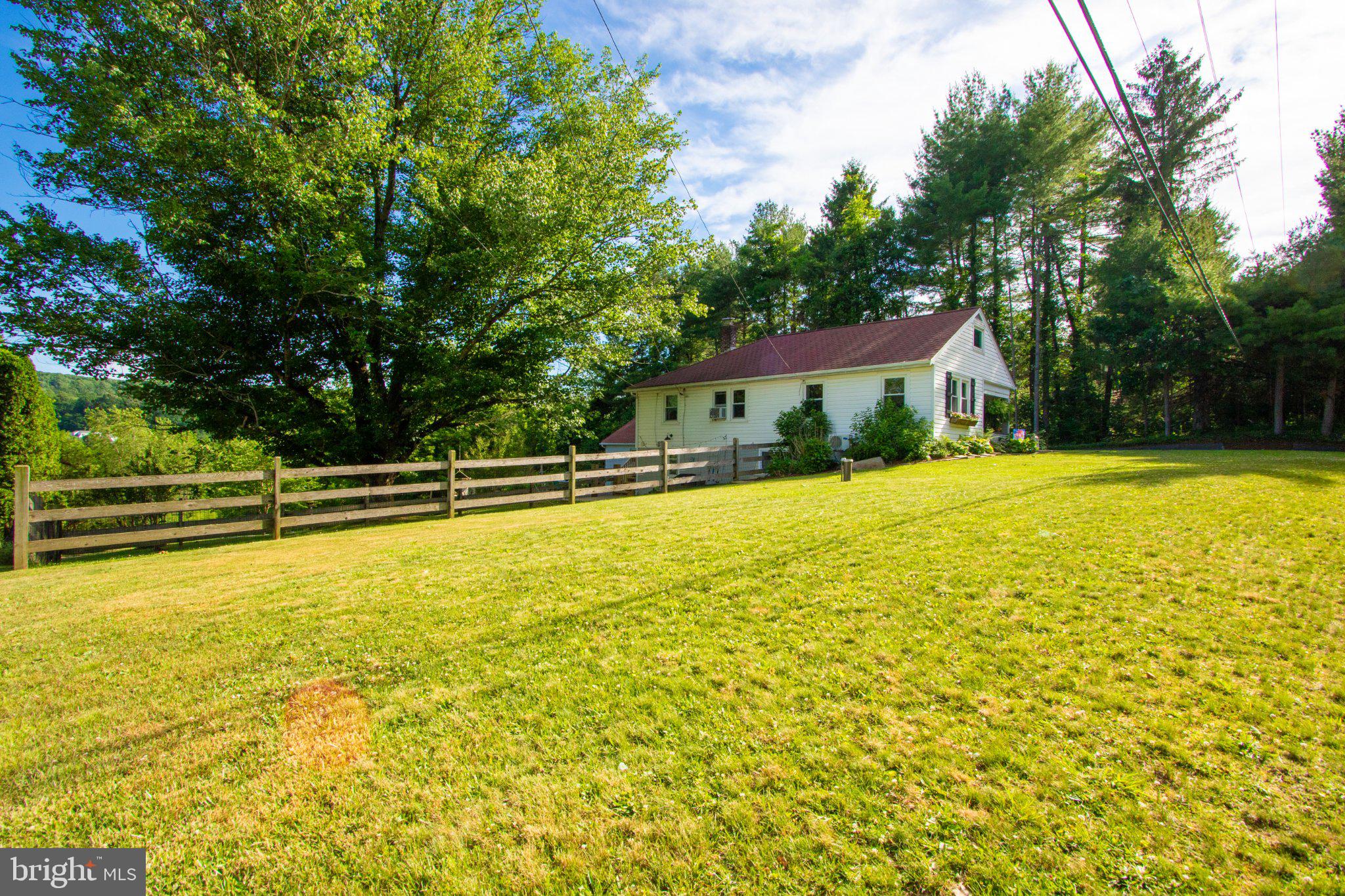 2056 Ridge Road Elverson, PA 19520 - Photo 87 of 89 Charming home nestled in lush greenery.