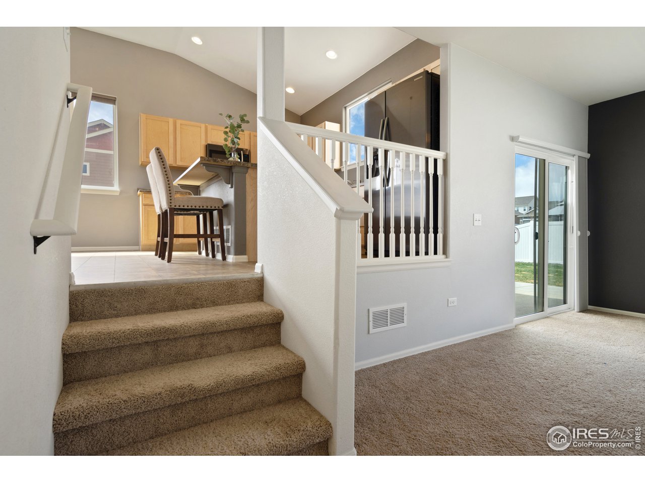 8705 13th St Road Greeley, CO 80634 - Photo 17 of 40 Stairs to lower family room.