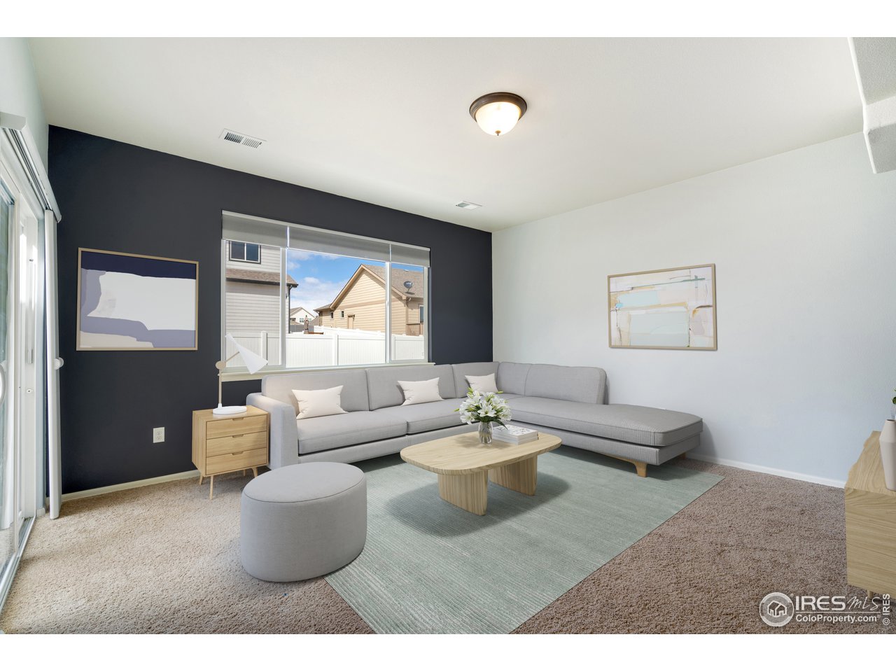 8705 13th St Road Greeley, CO 80634 - Photo 18 of 40 Lower level family room (virtually staged)