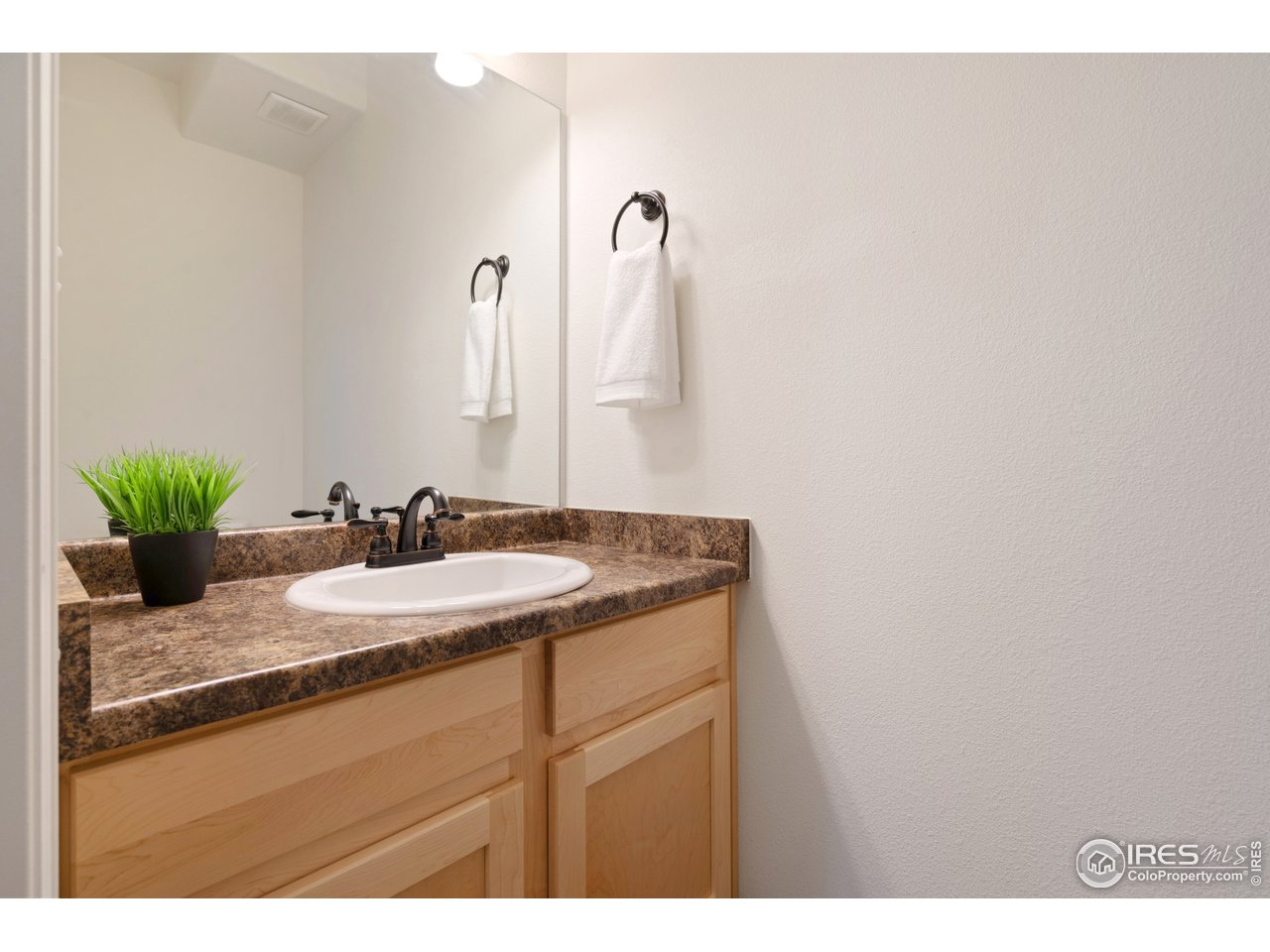 8705 13th St Road Greeley, CO 80634 - Photo 20 of 40 Half bath off the family room