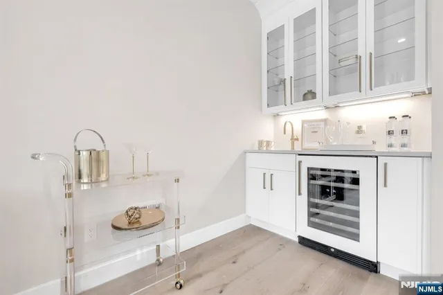 a kitchen with a sink and a stove