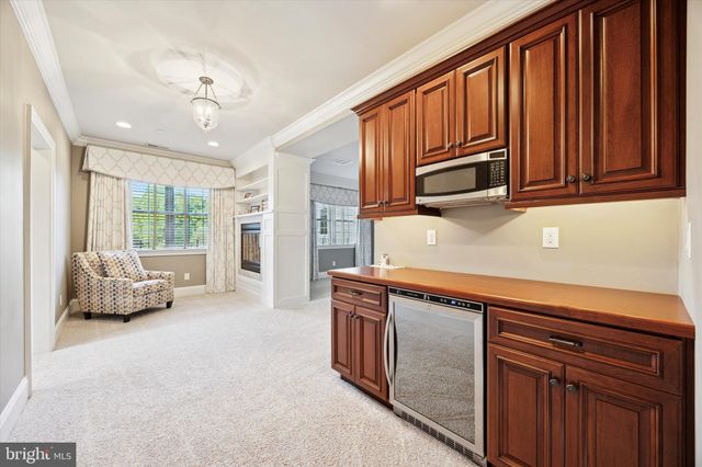 a view of swimming pool with a yard