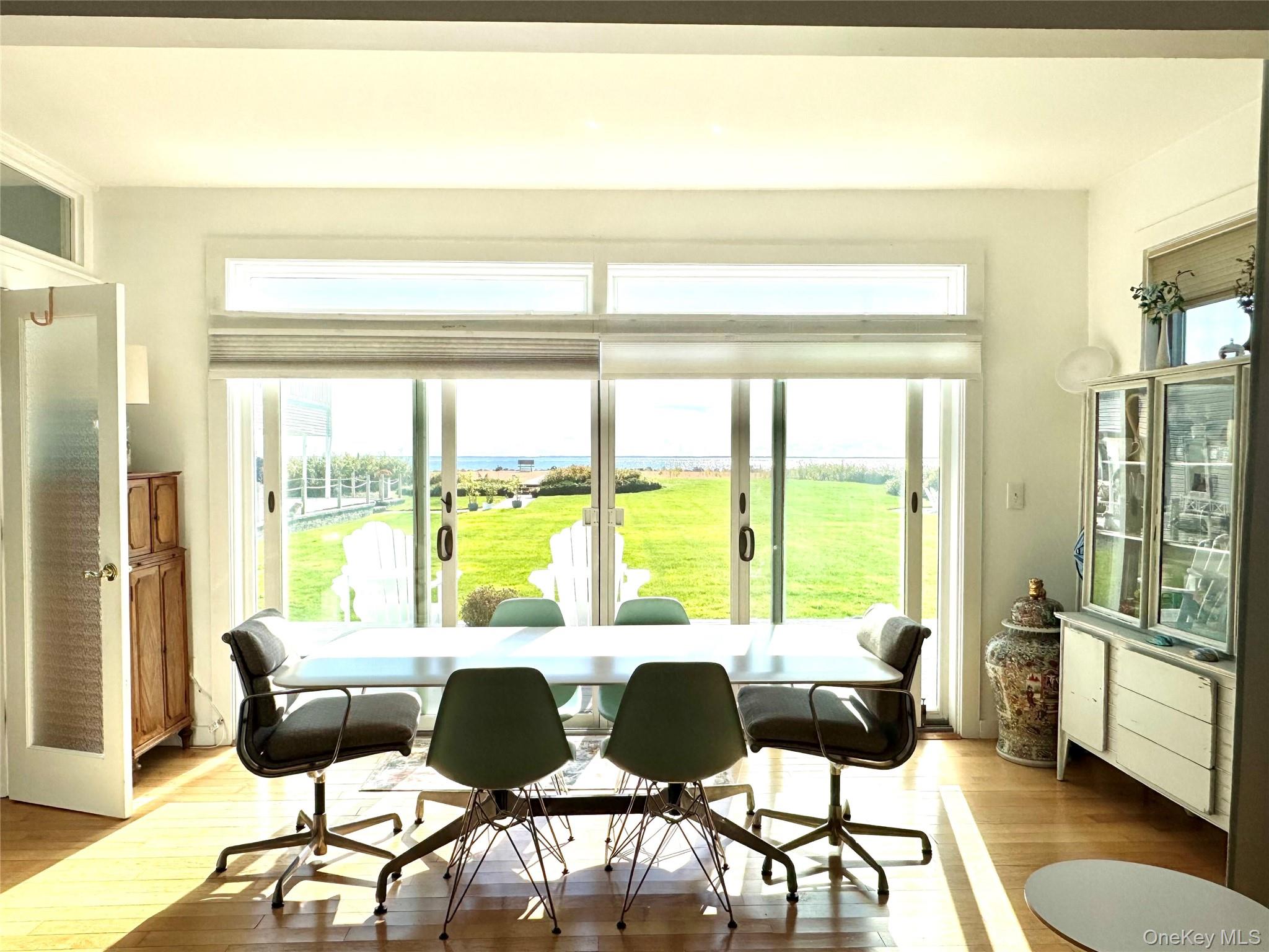42 Browns River Road, Unit A Sayville, NY 11782 - Photo 7 of 15 a living room with furniture and a large window