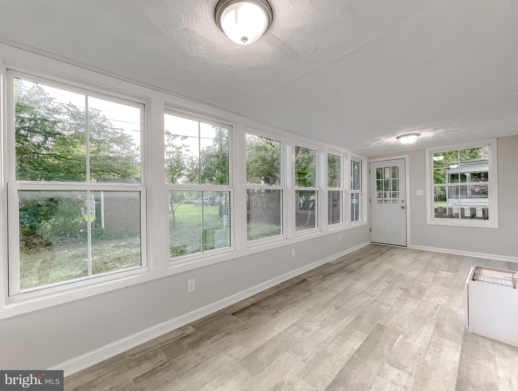 1528 Lincoln Road Shady Side, MD 20764 - Photo 8 of 42 Enclosed Rear Porch