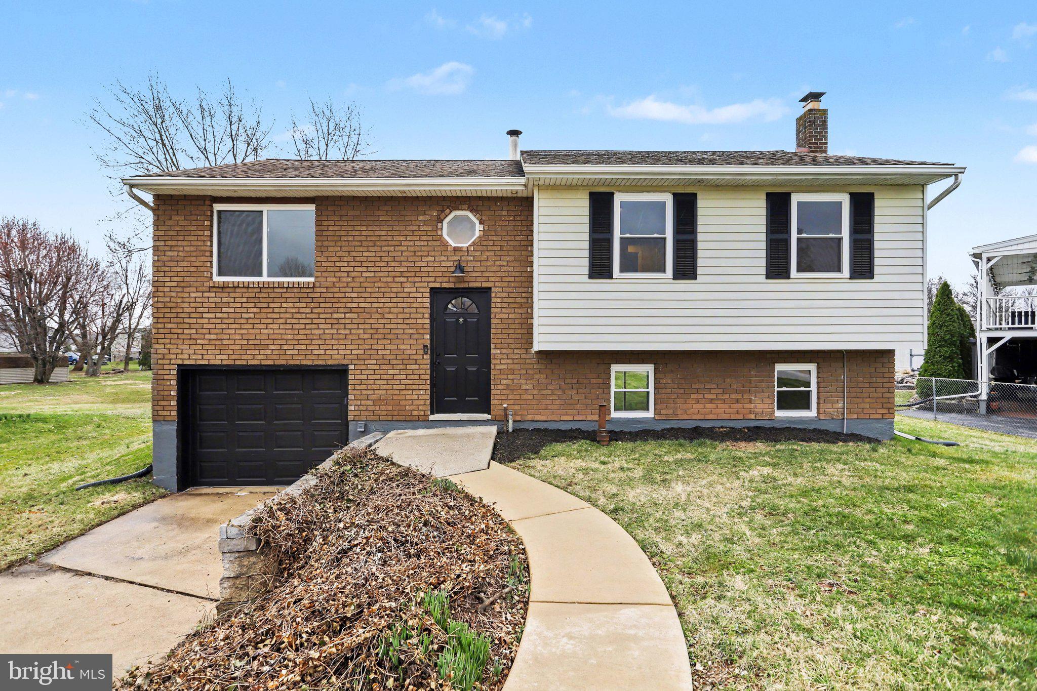 4273 Marlborough Road Dover, PA 17315 - Photo 1 of 29 a front view of a house with a yard