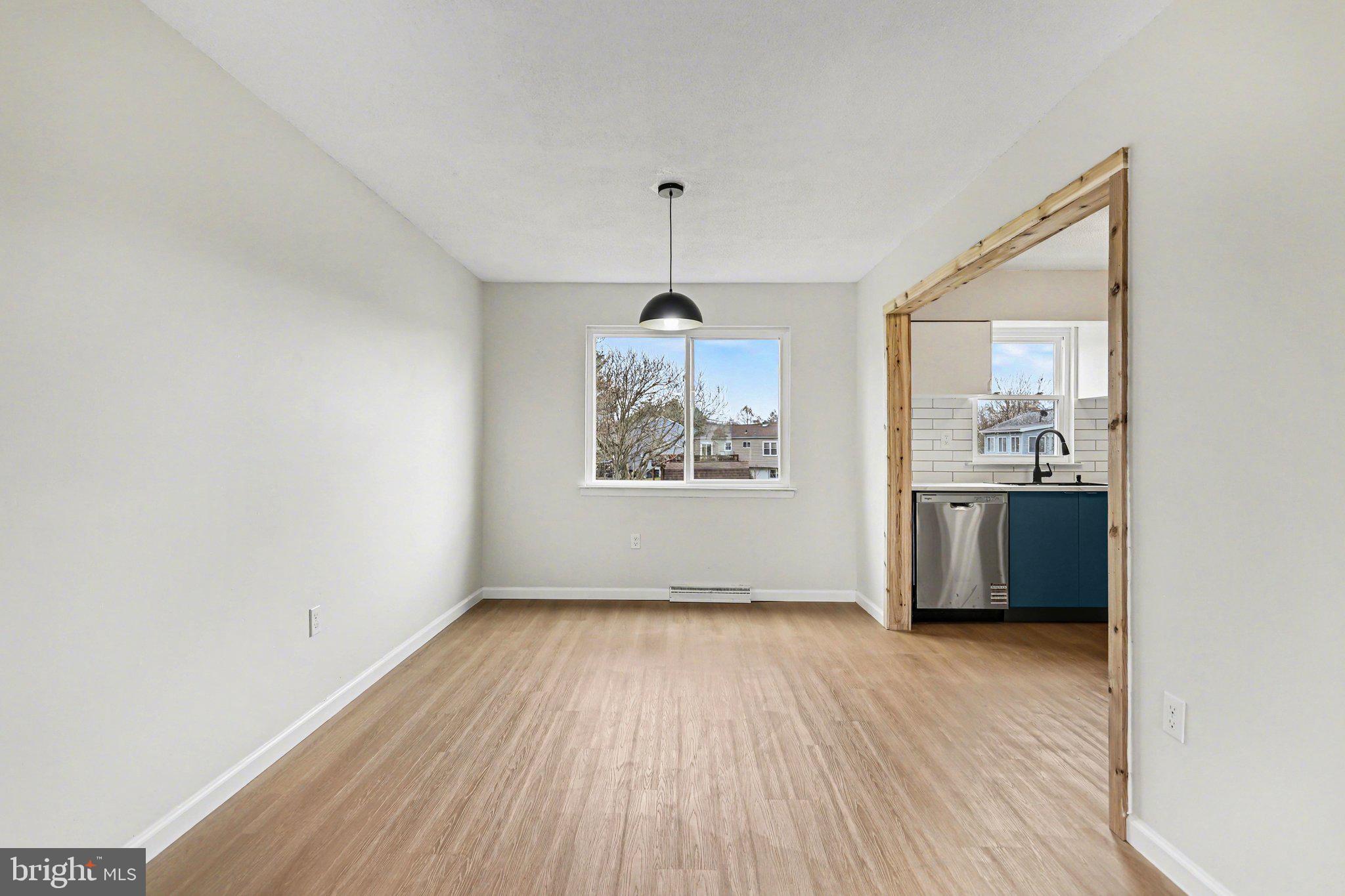 4273 Marlborough Road Dover, PA 17315 - Photo 8 of 29 wooden floor in an empty room with a window