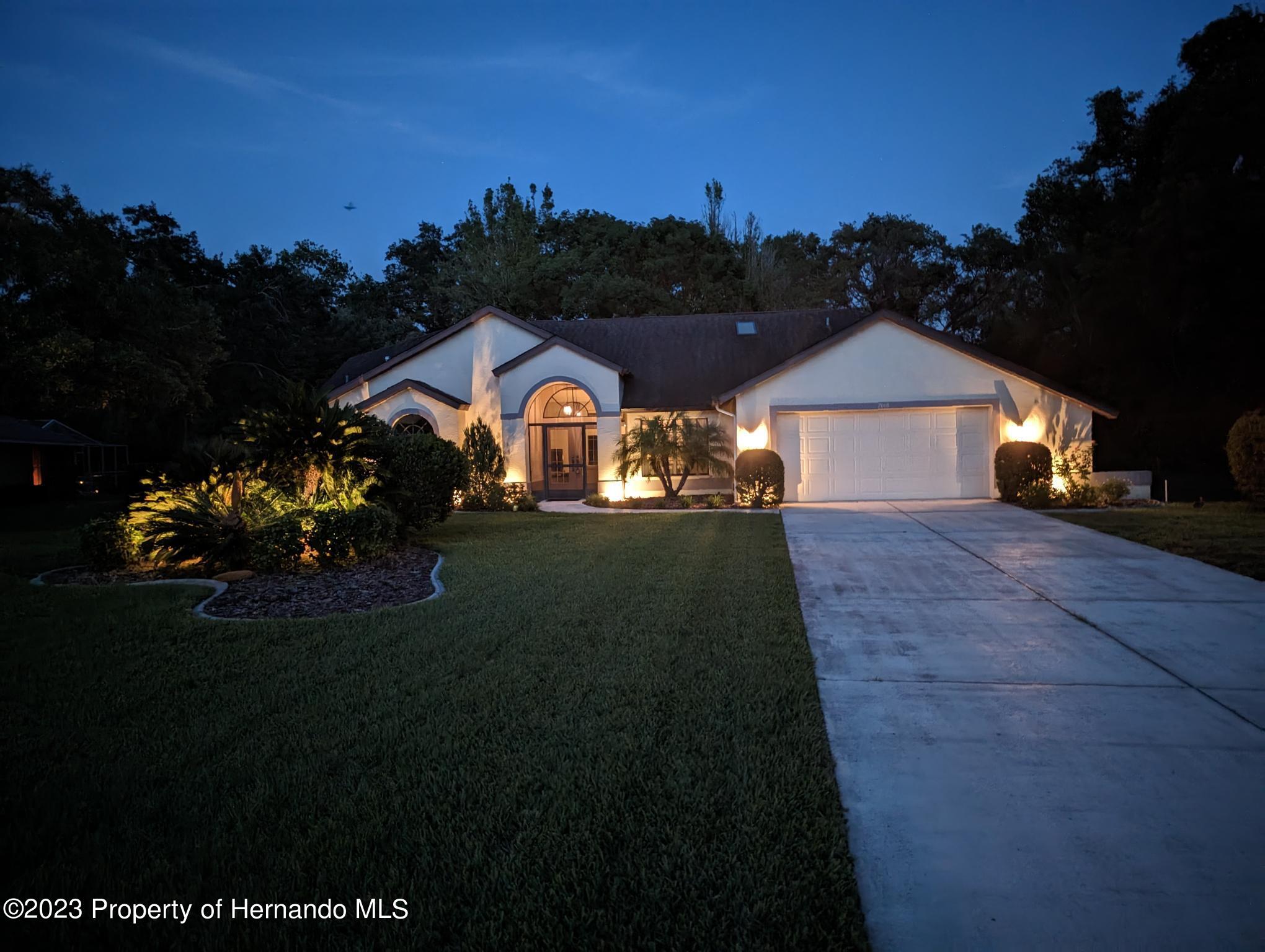2068 Brigadier Drive Spring Hill, FL 34608 - Photo 38 of 39 night time light picture 1