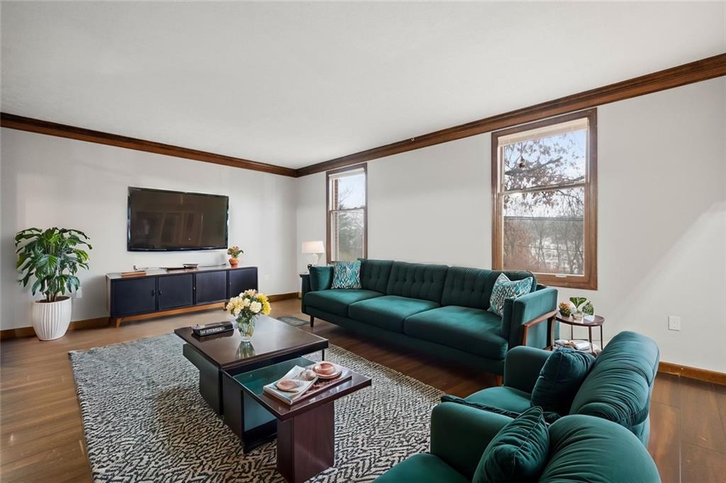 510 West Ingomar Road Pittsburgh, PA 15237 - Photo 16 of 50 The wood flooring carries into the formal living room which is flooded with natural light and toped with rich crown molding