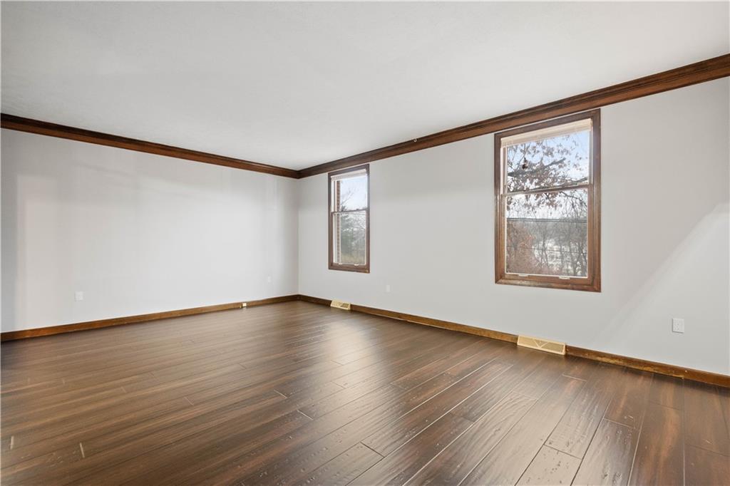 510 West Ingomar Road Pittsburgh, PA 15237 - Photo 17 of 50 The wood flooring carries into the formal living room which is flooded with natural light and toped with rich crown molding