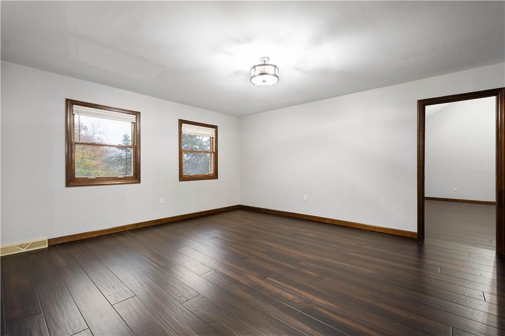 510 West Ingomar Road Pittsburgh, PA 15237 - Photo 26 of 50 The primary suite boasts wood flooring, upgraded light, and ample natural light