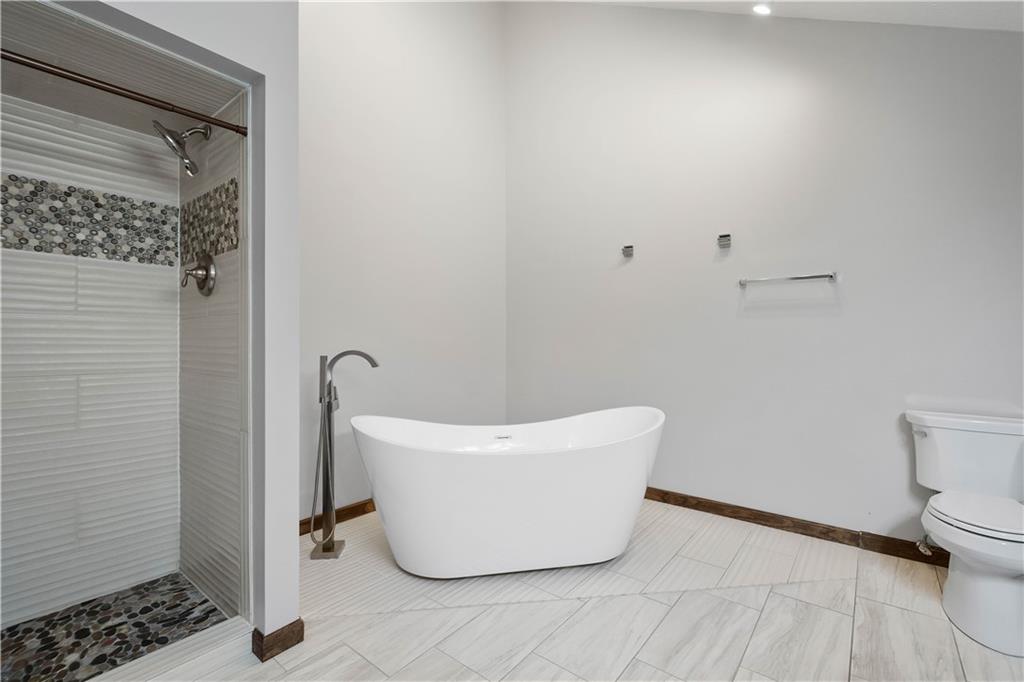 510 West Ingomar Road Pittsburgh, PA 15237 - Photo 28 of 50 A stand-alone soaking tub, tiled walk-in shower, double vanity, skylights, and cathedral ceiling can be found in the primary en-suite bath