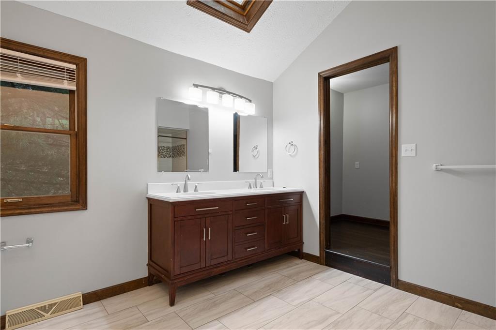 510 West Ingomar Road Pittsburgh, PA 15237 - Photo 30 of 50 A stand-alone soaking tub, tiled walk-in shower, double vanity, skylights, and cathedral ceiling can be found in the primary en-suite bath