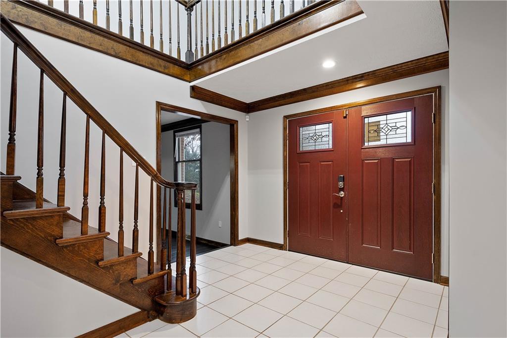 510 West Ingomar Road Pittsburgh, PA 15237 - Photo 3 of 50 Tile flooring and rich wood tones bring warmth to the spacious two-story entry