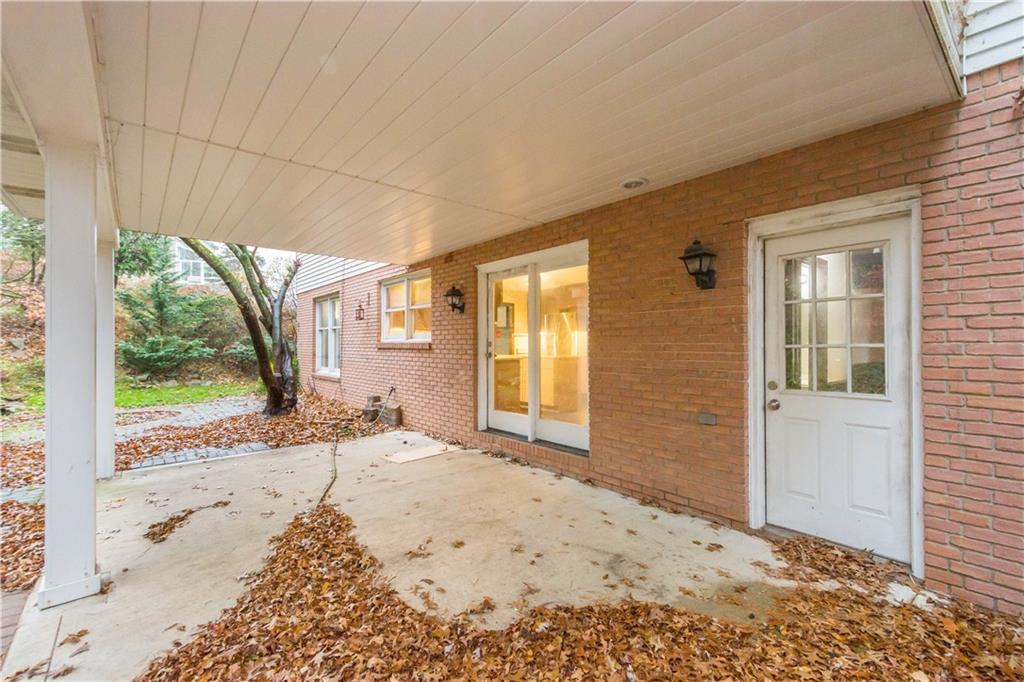 510 West Ingomar Road Pittsburgh, PA 15237 - Photo 43 of 50 The covered rear patio sits in a completely private wooded oasis