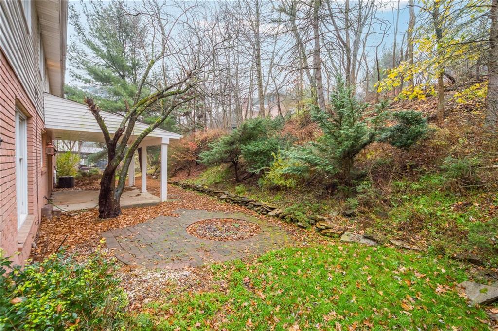 510 West Ingomar Road Pittsburgh, PA 15237 - Photo 44 of 50 The covered rear patio sits in a completely private wooded oasis