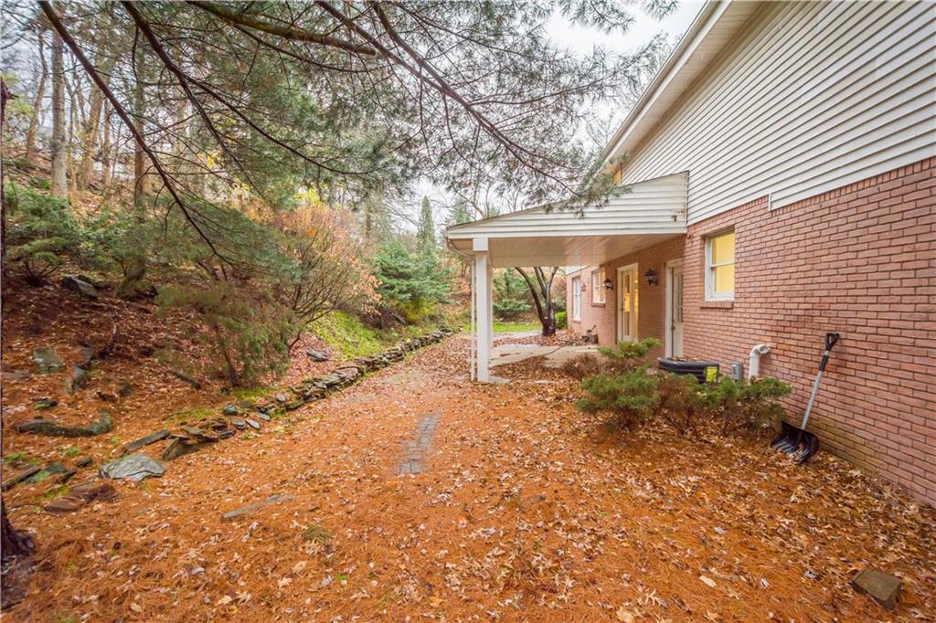 510 West Ingomar Road Pittsburgh, PA 15237 - Photo 46 of 50 The covered rear patio sits in a completely private wooded oasis