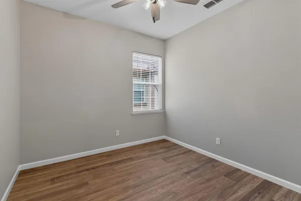 a view of storage and utility room with closet