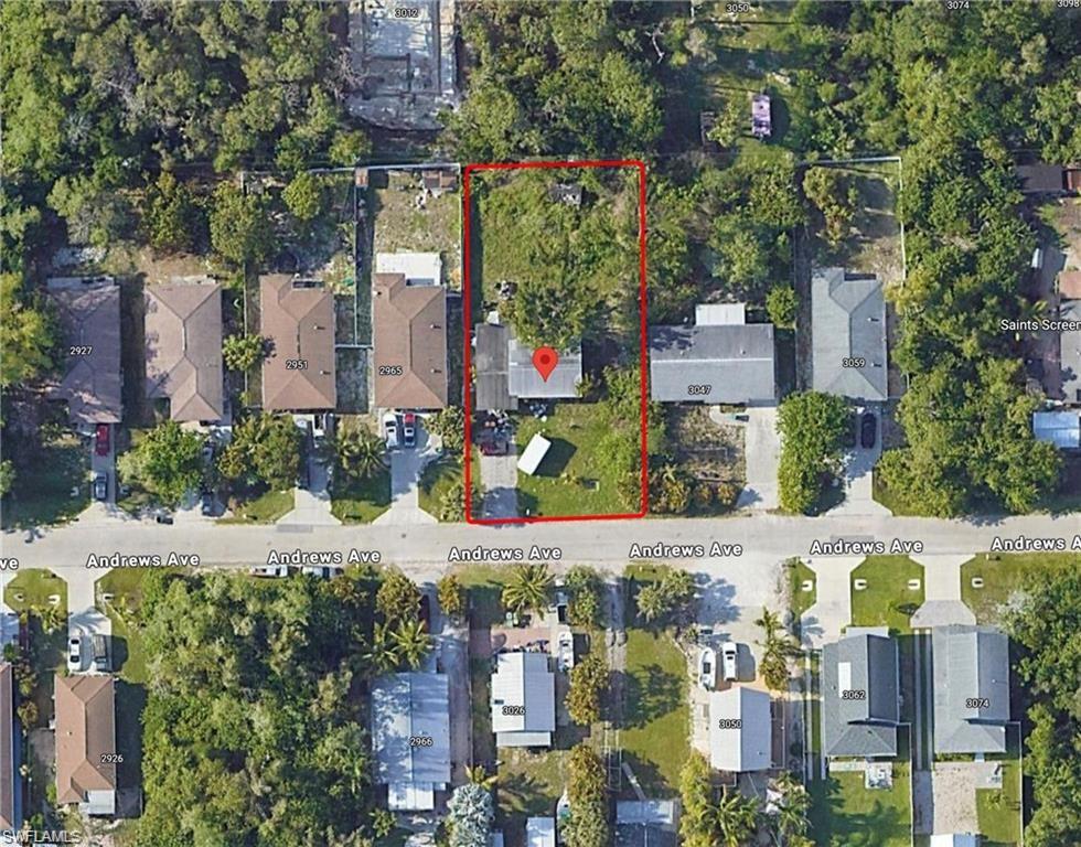 3023 Andrews Avenue Naples, FL 34112 - Photo 1 of 6 an aerial view of multiple house
