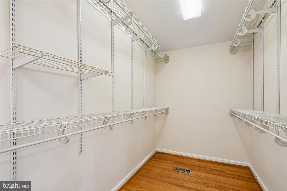 3633 Patuxent River Road Davidsonville, MD 21035 - Photo 42 of 85 Spacious Walk-in Closet w/Multiple Shelves & Rods
